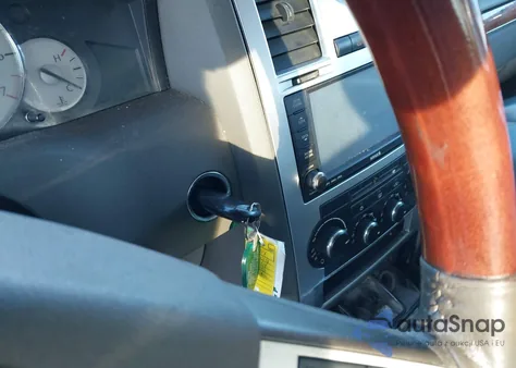 2009 Chrysler 300 Limited z USA, uszkodzony, nr VIN 2C3KA33V69H543994